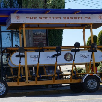 The Rolling Barrel parked in front of Chintz & Company and waiting for tourists to return from their refreshment break at the Canoe Club.