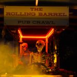 This is the Rolling Barrel at Halloween time decorated with a skeleton driver and passenger and rolling through the autumn fog of Victoria, British Columbia.