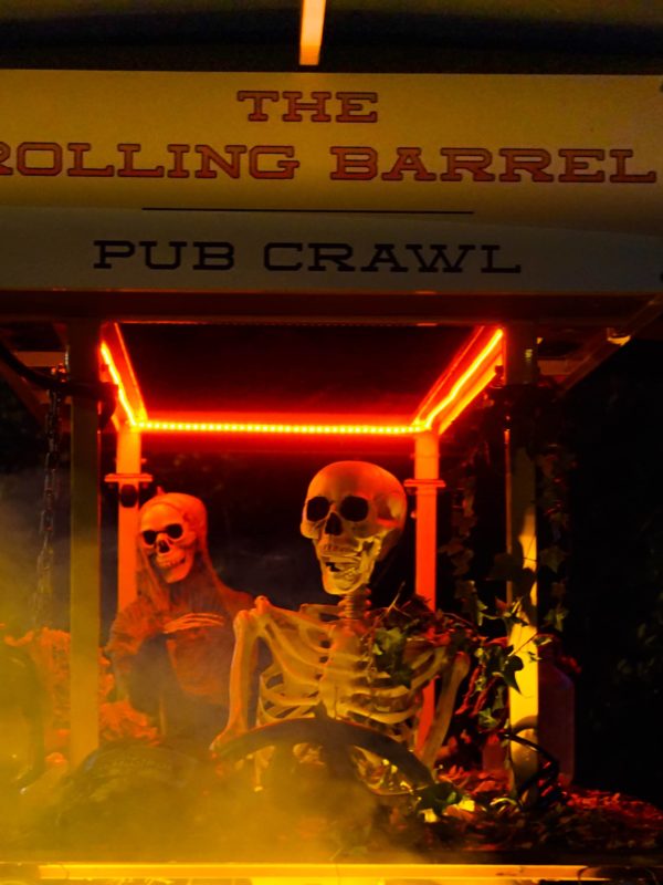 This is the Rolling Barrel at Halloween time decorated with a skeleton driver and passenger and rolling through the autumn fog of Victoria, British Columbia.
