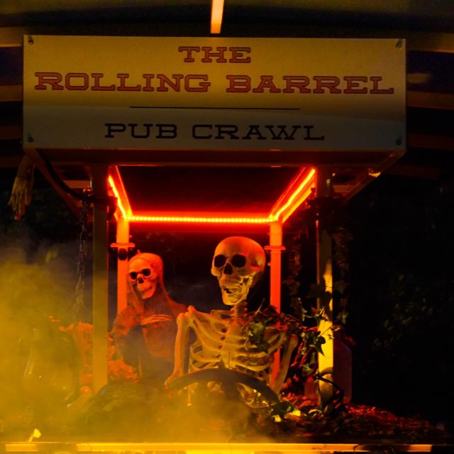 This is the Rolling Barrel at Halloween time decorated with a skeleton driver and passenger and rolling through the autumn fog of Victoria, British Columbia.